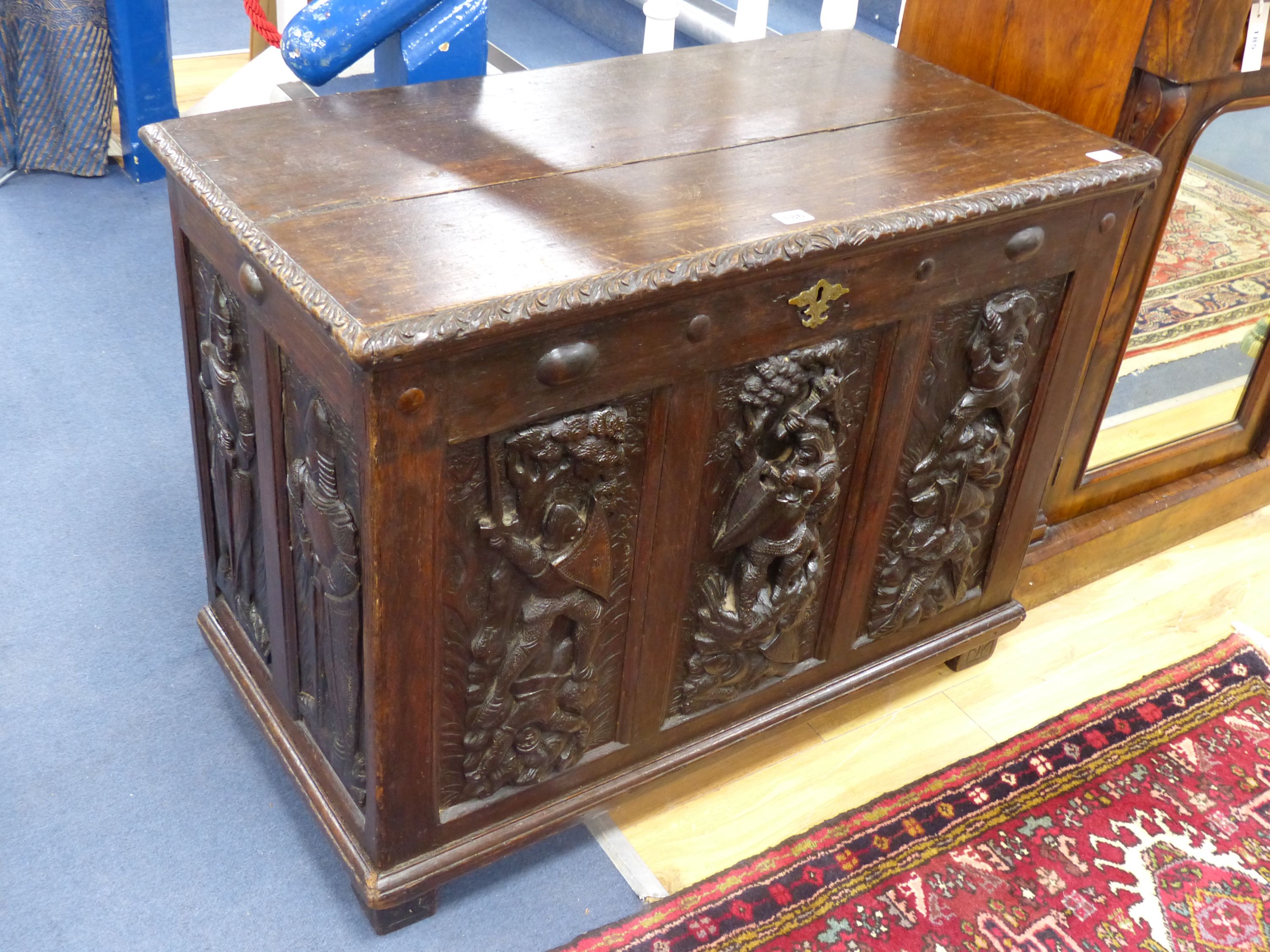 A 19th century Flemish carved oak coffer, length 89cm, depth 48cm, height 69cm